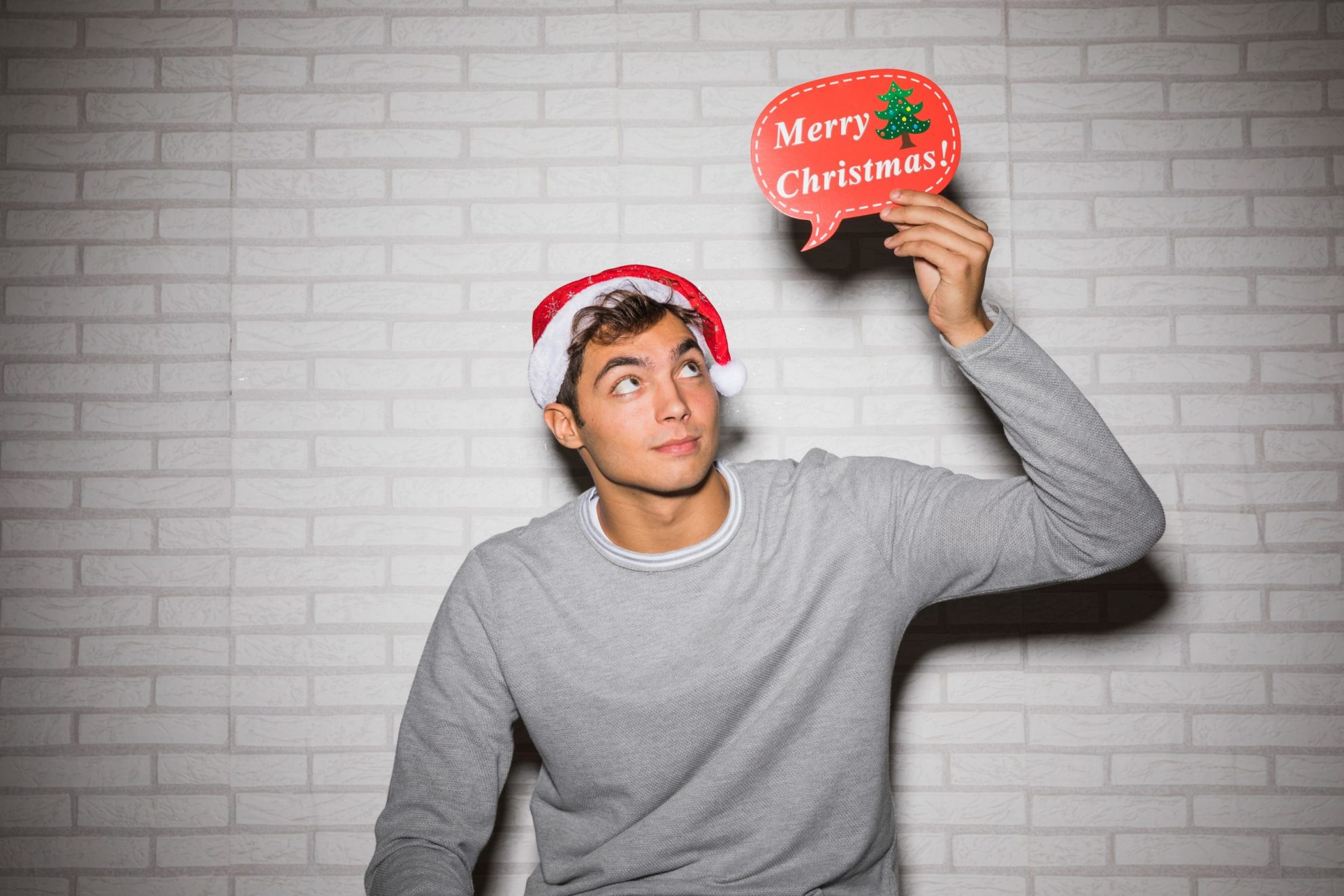 Photo of pensive man illustrates blog: 3 Ways to Help Your Team Overcome the Holiday Blues