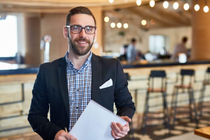 Photo of confident small business owner illustrates blog:3 Trends Every Small Business Should Consider in 2021