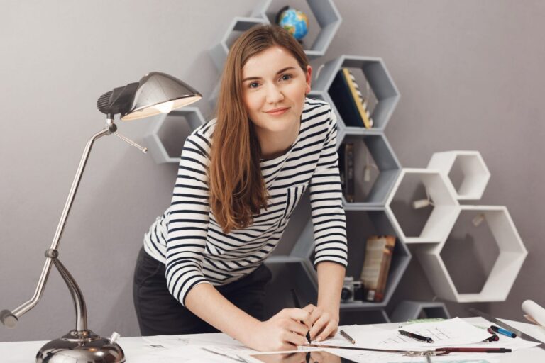 Image of woman drawing illustrates blog: How to Promote Creativity in the Workplace