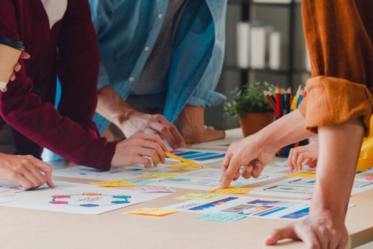 Photo of team working together illustrates blog: "Beware of Collaborative Overload"