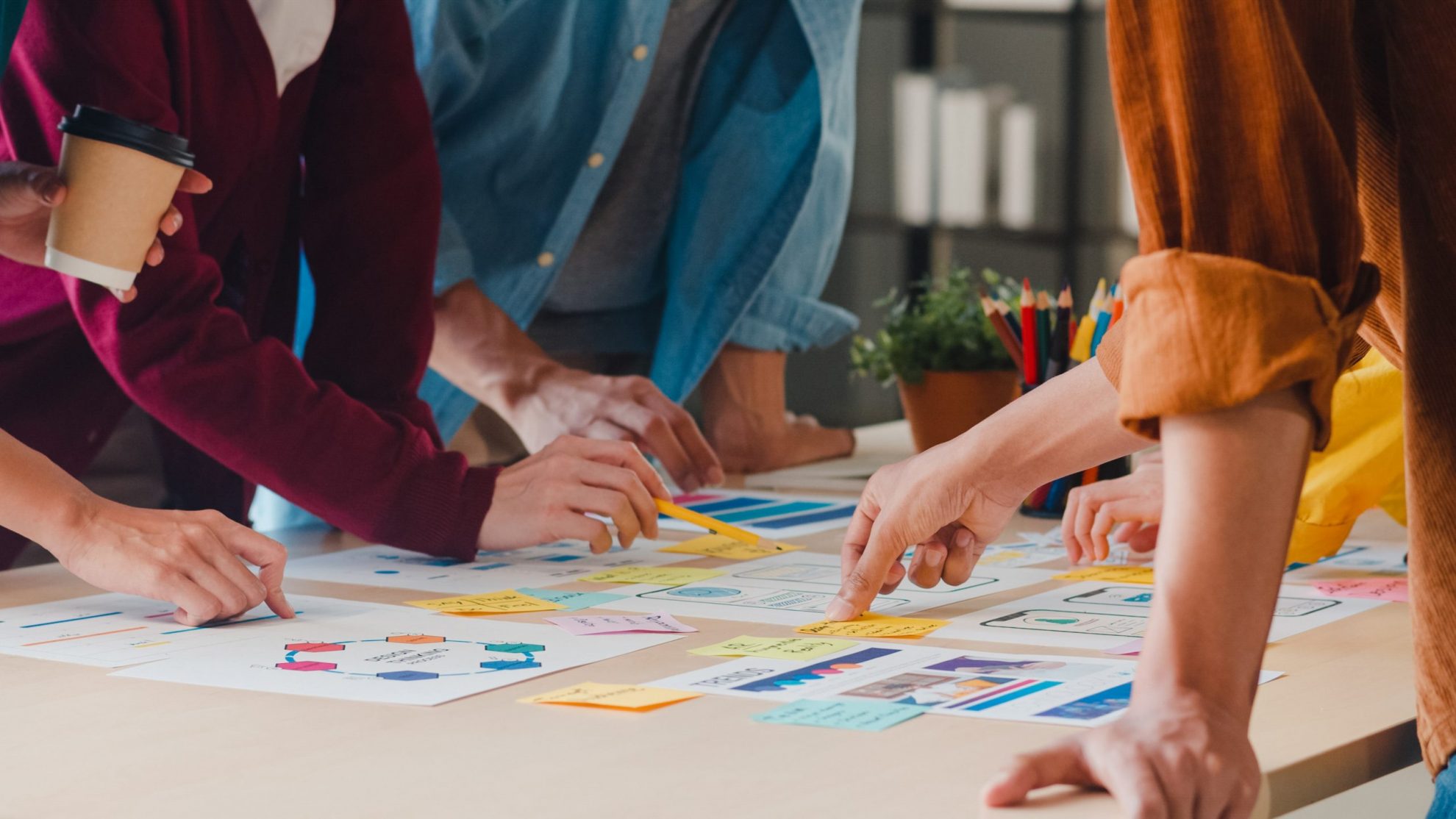 Photo of team working together illustrates blog: "Beware of Collaborative Overload"