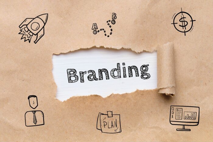 Brown paper with a ripped section where it reads "Branding"