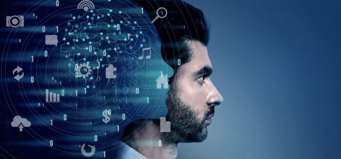 AI-entrepreneurs-FP Image showing profile of man with superimposed tech-inspired graphics illustrates blog "4 Ways Entrepreneurs Can Use Artificial Intelligence"