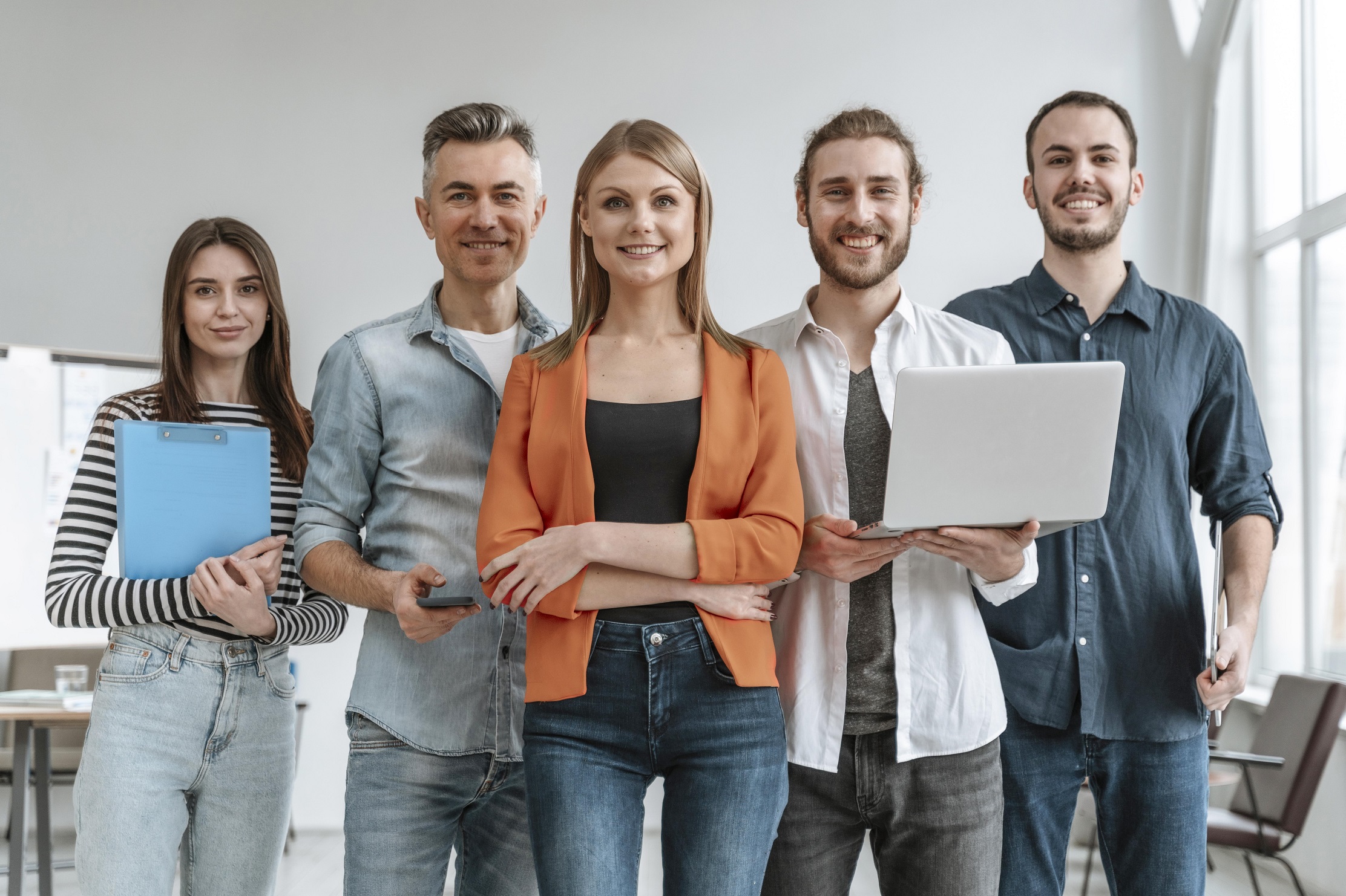 professionals-fp Group of professionals dressed casually illustrates blog "What Are SMART Goals?"