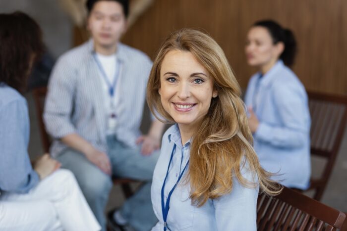 employee-smlling-fp Employee smiling illustrates blog "How Small Businesses Can Create an Amazing Candidate Experience"