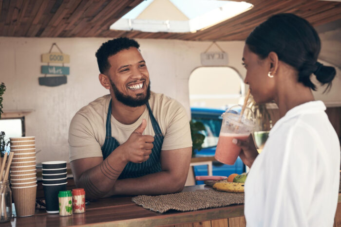 Small business owner promoting a customer loyalty program in the Inland Empire