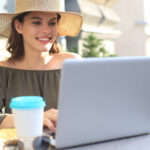 Small business owner managing Email marketing Pomona campaign on laptop