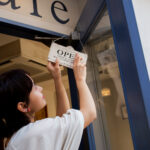 Small business owner improving local branding in the Pomona business community