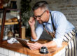 local business owner reviewing mobile optimization on a smartphone