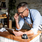 local business owner reviewing mobile optimization on a smartphone