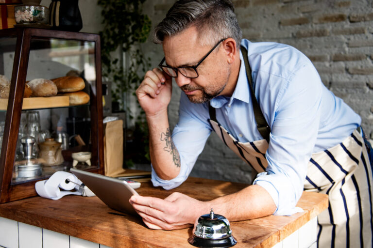 local business owner reviewing mobile optimization on a smartphone