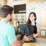 Small business owner using personalized service to improve customer experience