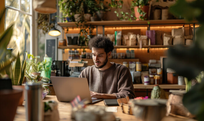 Image-AI-Tools-for-Businesses-Improve-Local-Efficiency Local owner using AI tools for businesses