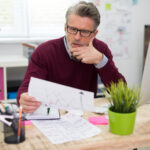 Small business owner creating a business budget