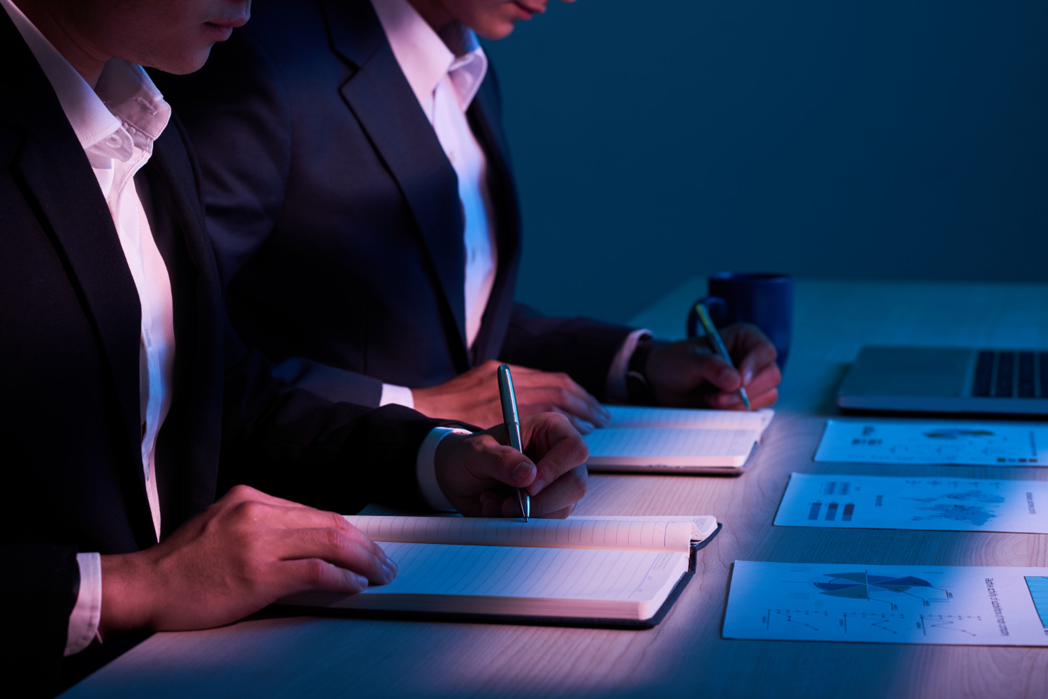 image-prepare-business-next-stage Professionals reviewing prepare business next stage strategy and planning documents