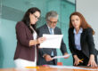Professionals reviewing small businesses building stronger strategy and planning documents