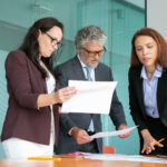 Professionals reviewing small businesses building stronger strategy and planning documents