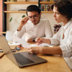 Small-company leaders discussing business succession planning